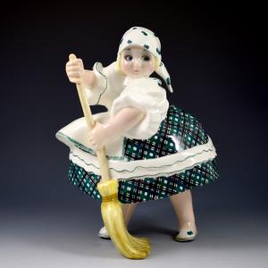 Mädchen mit Besen